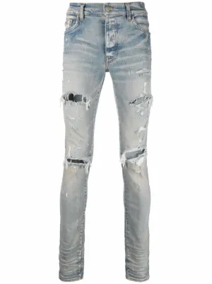 AMIRI distressed skinny jeans