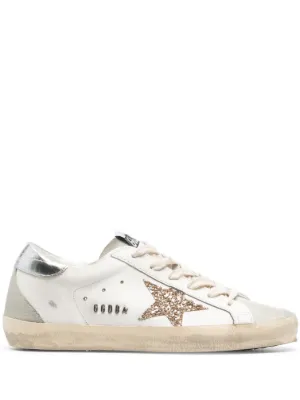 Golden Goose Super-Star trainers with gold glitter star and ice-gray suede inserts