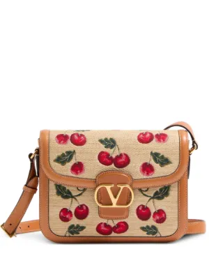 Valentino Garavani 9To5 shoulder bag in jacquard raffia with Cherryfic motif