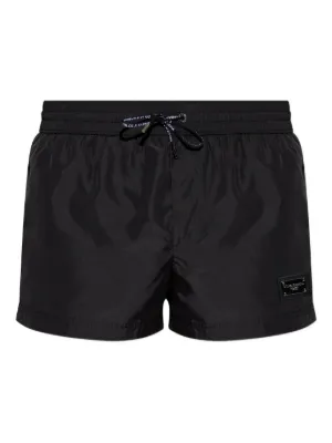 Dolce & Gabbana short swim trunks with branded tag