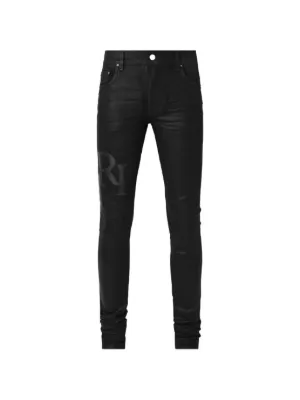AMIRI logo-patch waxed jeans