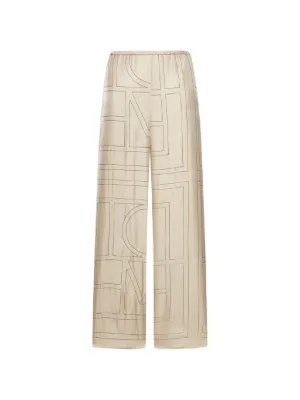 TOTEME monogram-print silk trousers