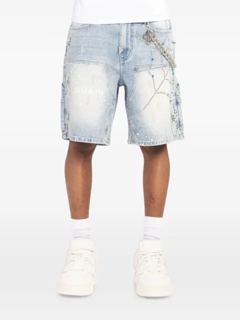 GUAPI spiderweb-embellished denim shorts